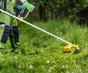 Eco-friendly lawn care service by Hawkins Landscaping using efficient grass trimming and sustainable maintenance practices to keep lawns healthy, neat, and environmentally responsible.